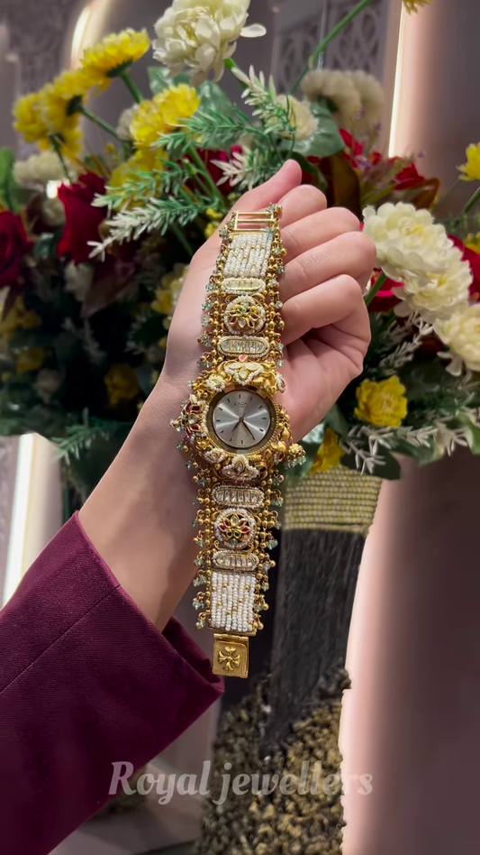 Exquisite Gold-Toned Watch with Elaborate Detailing