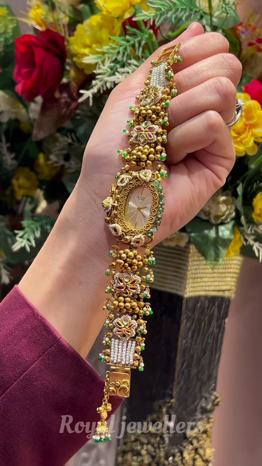 Exquisite Gold-Toned Watch with Elaborate Detailing