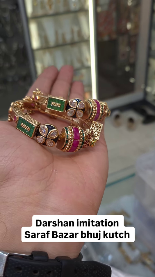 Exquisite Gold-Toned Bangles with Ruby and Pearl Accents