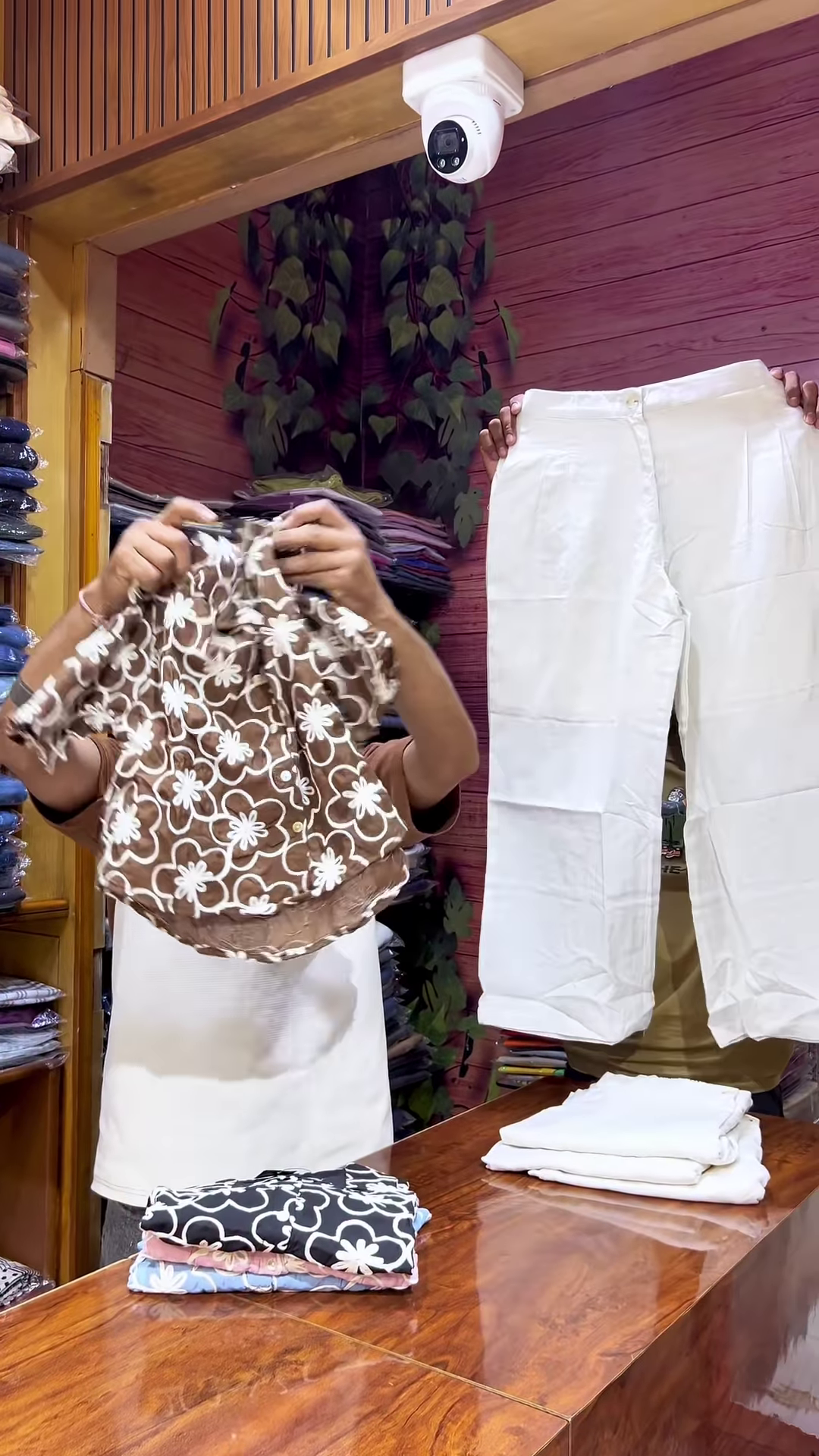 Blue Floral Crop Top with V-Neckline Paired with White Straight-Fit Pants