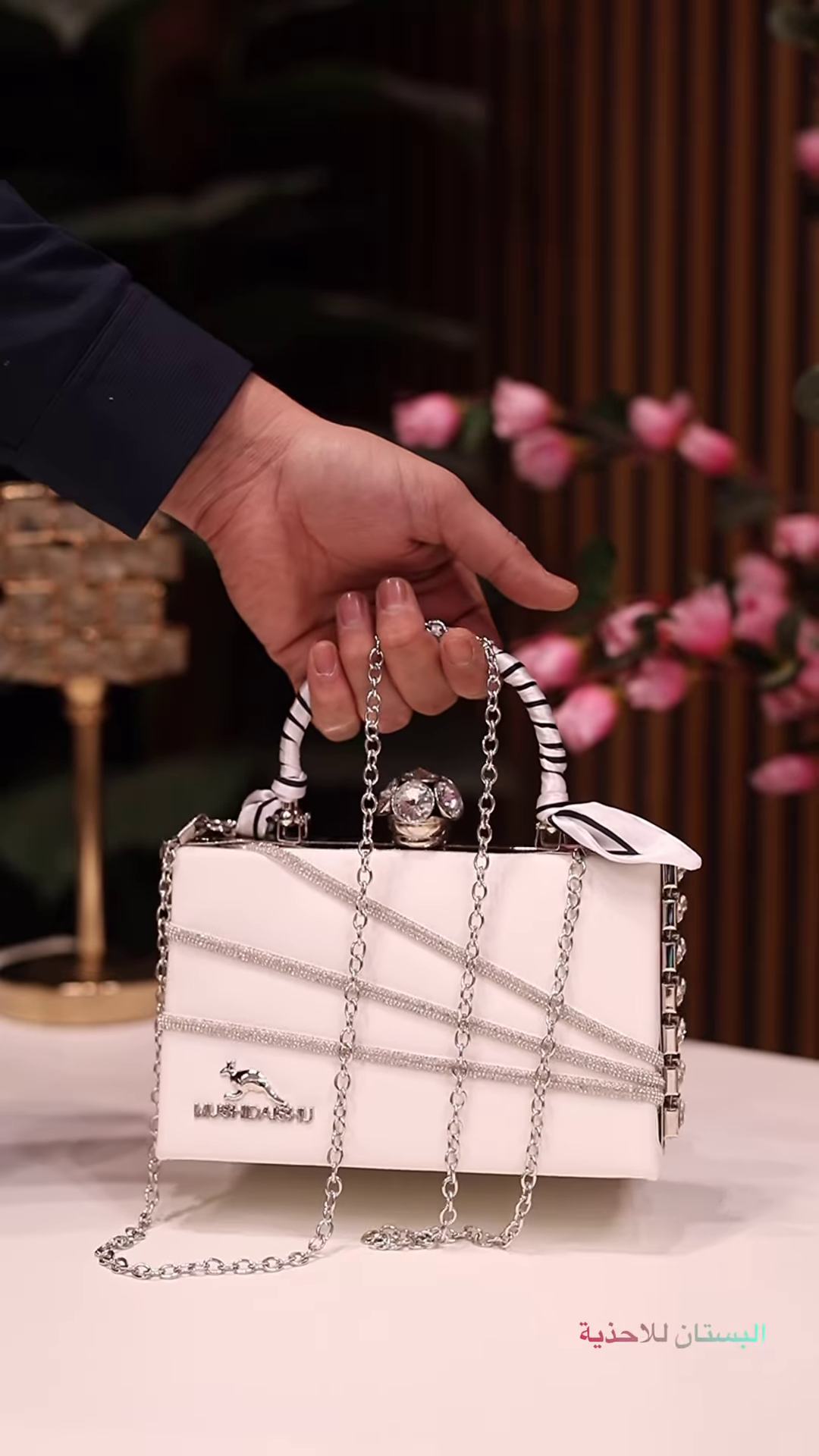 Elegant Ivory Clutch with Rhinestone Embellishments and Chain Strap