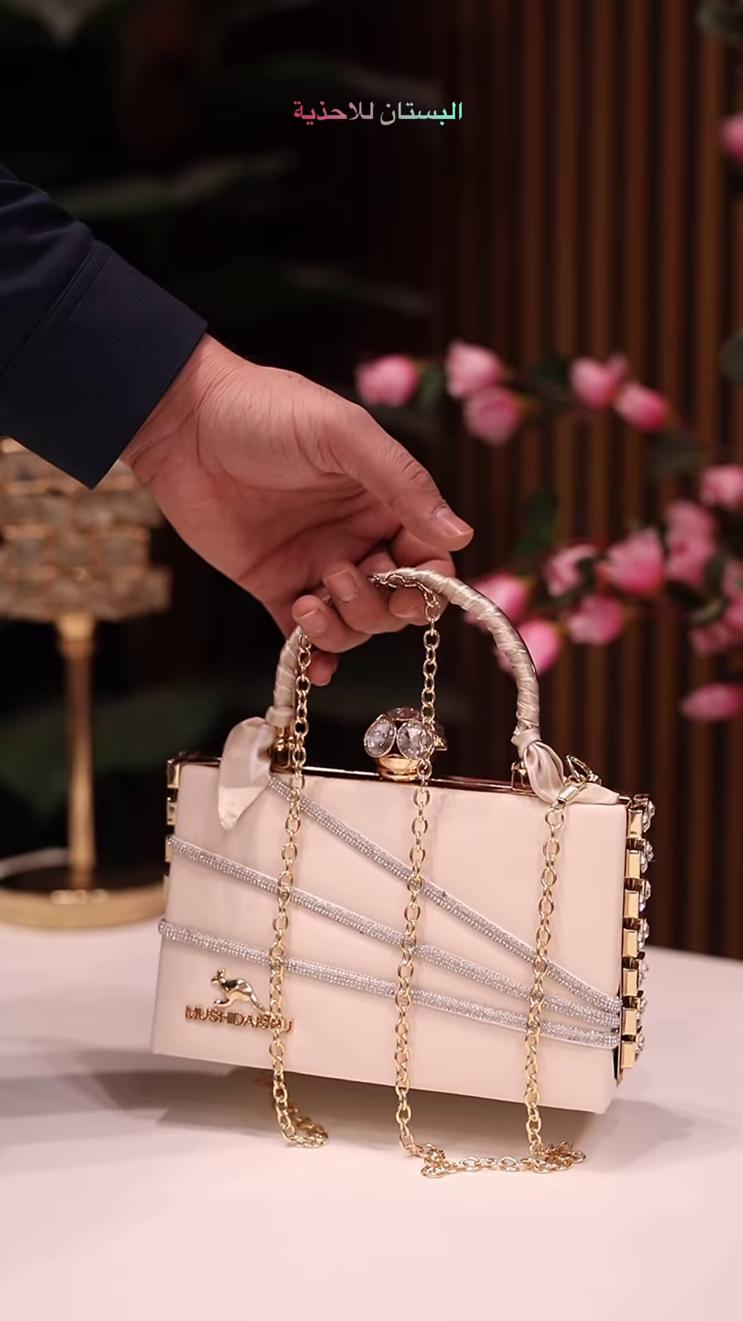 Elegant Ivory Clutch with Rhinestone Embellishments and Chain Strap