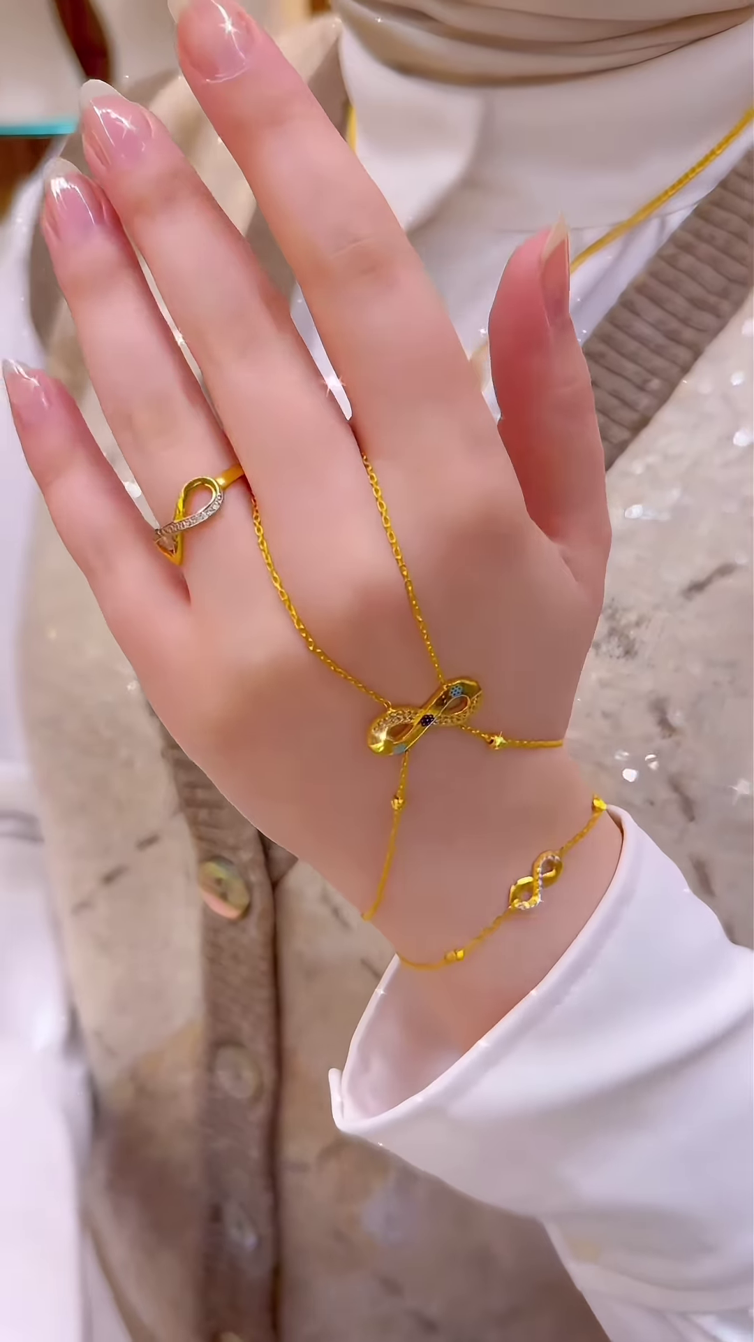 Elegant Gold-Toned Hand Chain Bracelet with Infinity Symbol and Sparkling Accents – Connected Ring