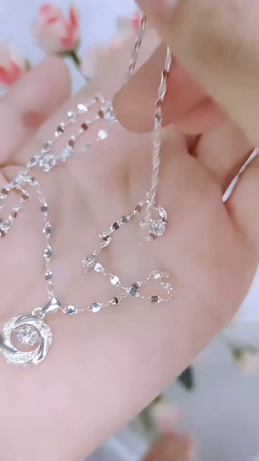 Elegant Silver Necklace with Twisted Floral Pendant – Sparkling Crystal Centerpiece