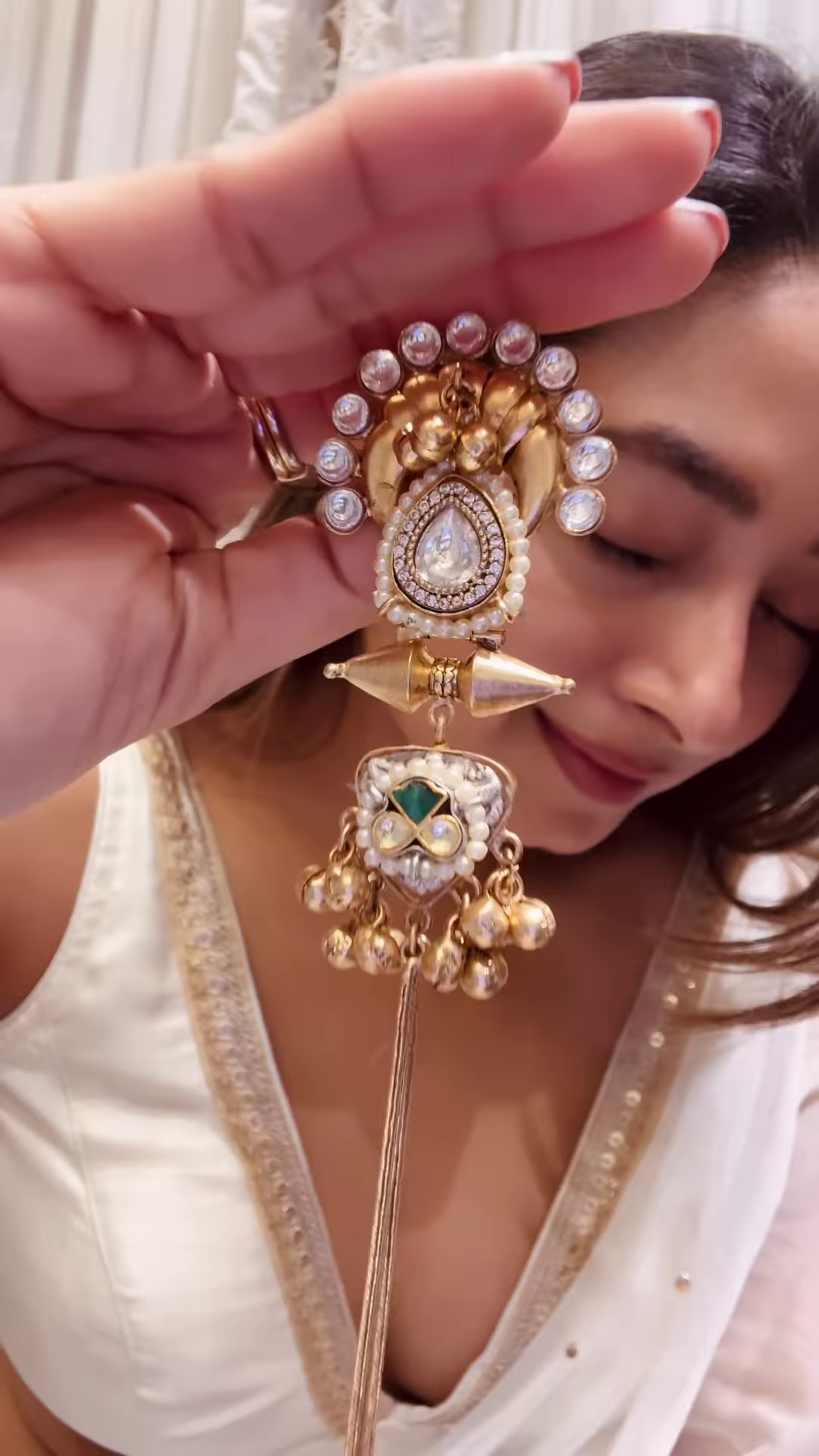 Elegant Gold-Toned Statement Earrings with Intricate Detailing and Chain Drapes