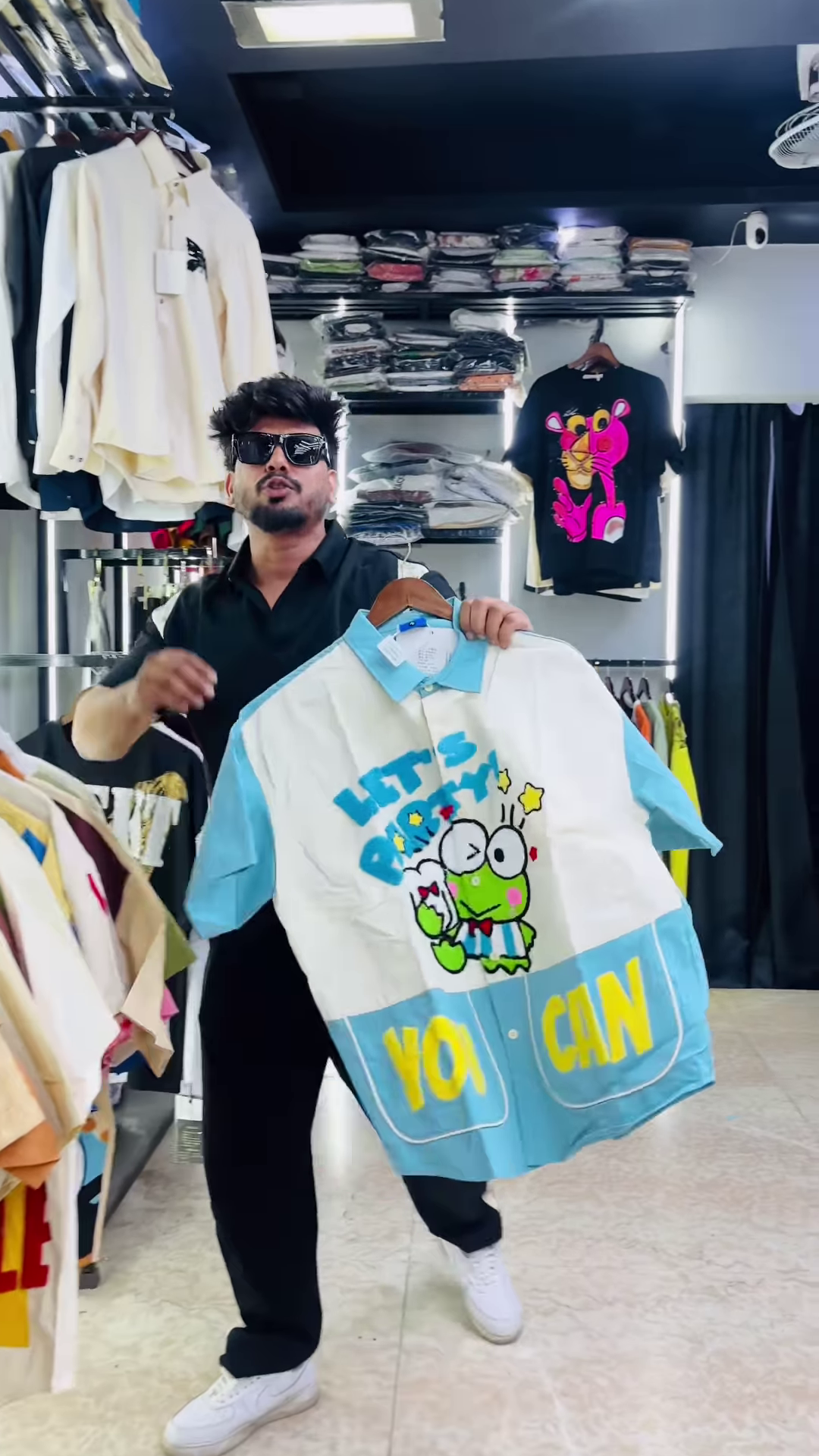 Bold Men’s Graphic Print Polo Shirt with Cartoon Characters and Text