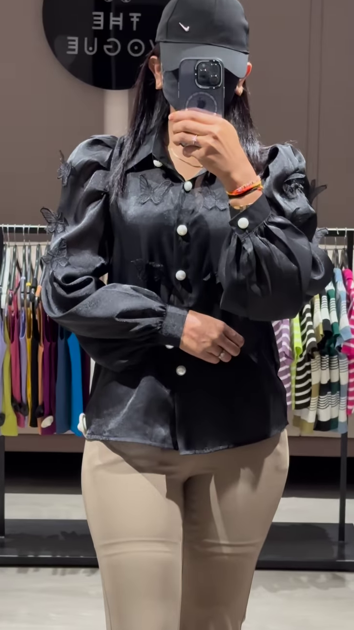 Elegant Sheer White Blouse with Ruffled Sleeves and Button-Down Front