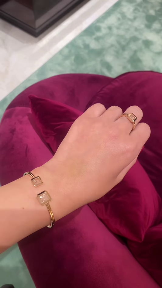 Elegant Gold-Toned Statement Ring with Floating Clear Gemstone