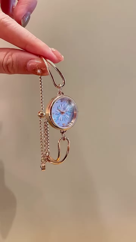 “Blossom Charm: Floral Dial Bracelet Watch for Women”