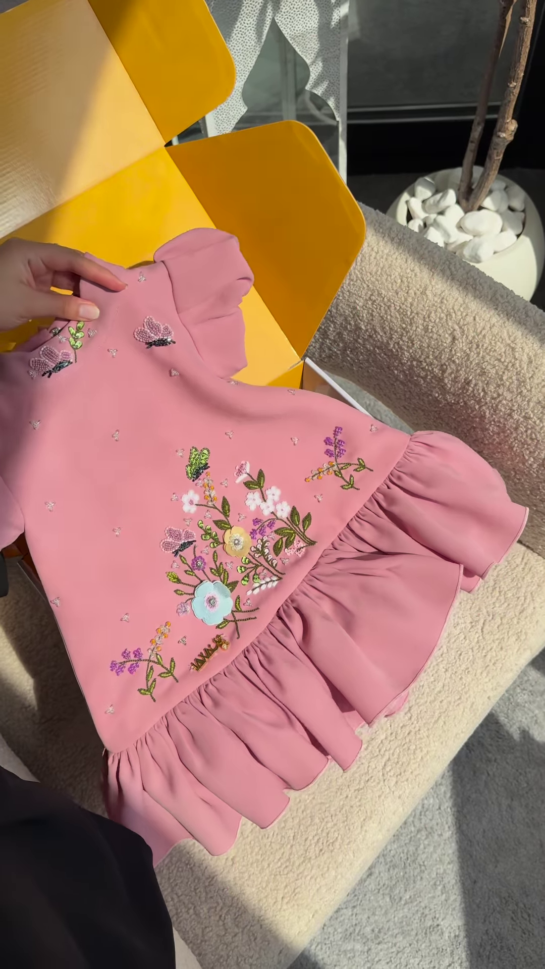 Elegant White Dress with Ruffled Hem and Bow Detail