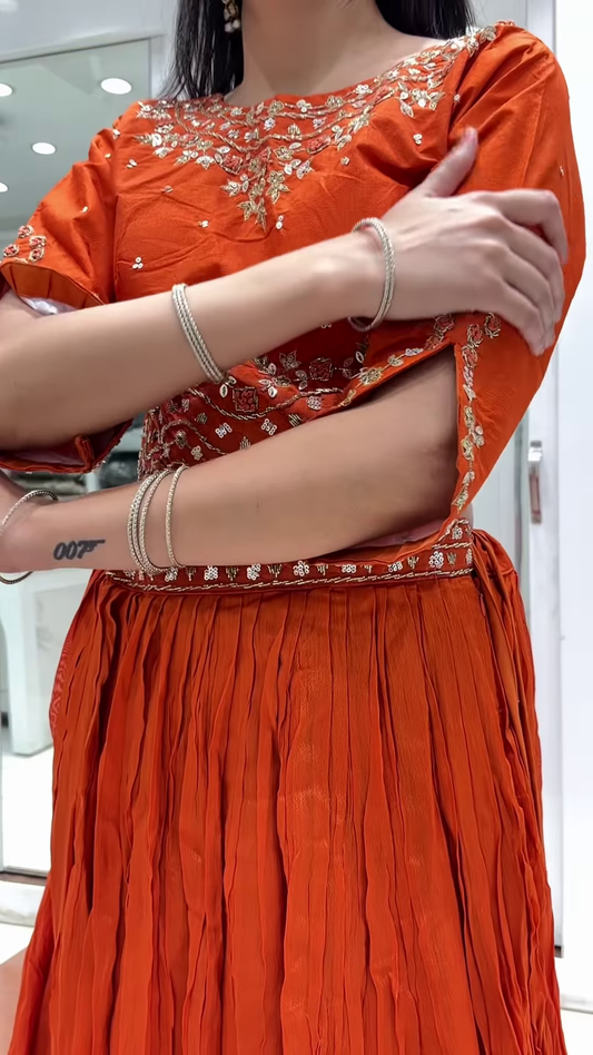 Vibrant Orange Draped Saree with Embellished Blouse