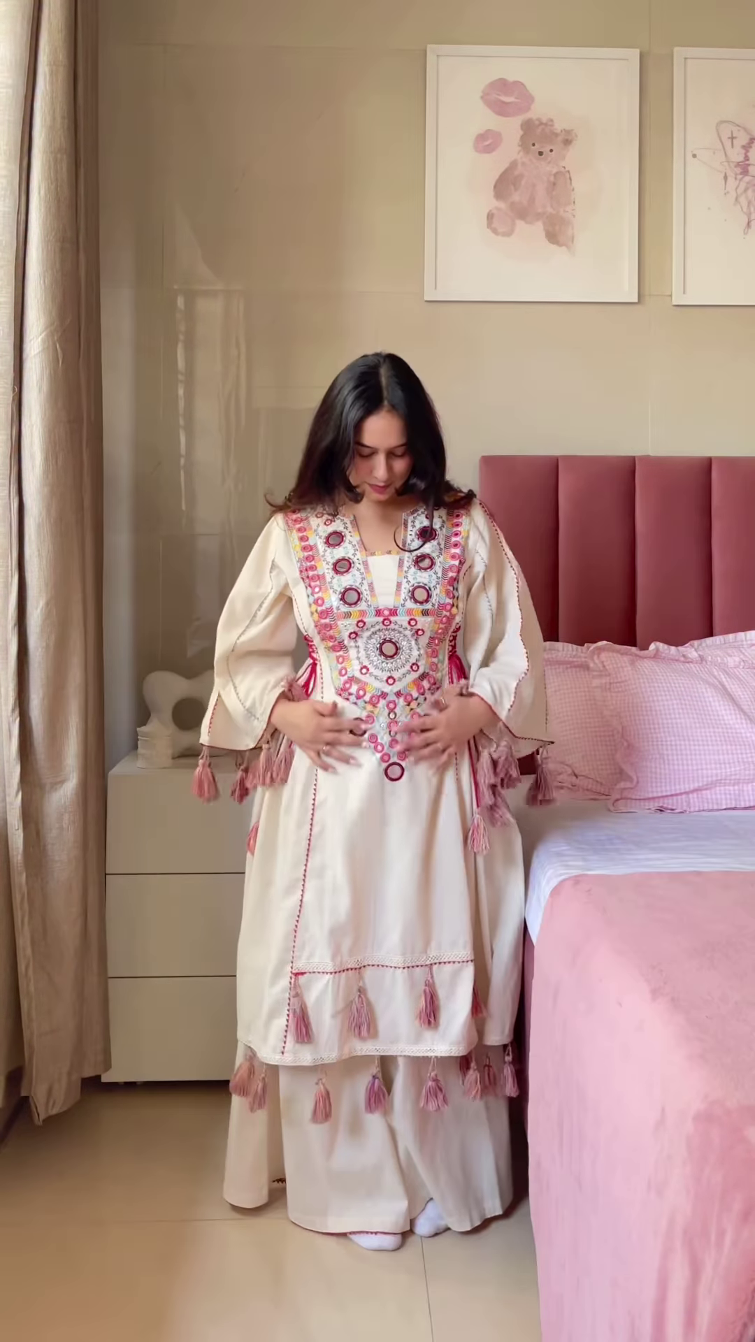 Cream-Colored Embroidered Traditional Dress with Colorful Circular Motifs and Pink Tassel Accents
