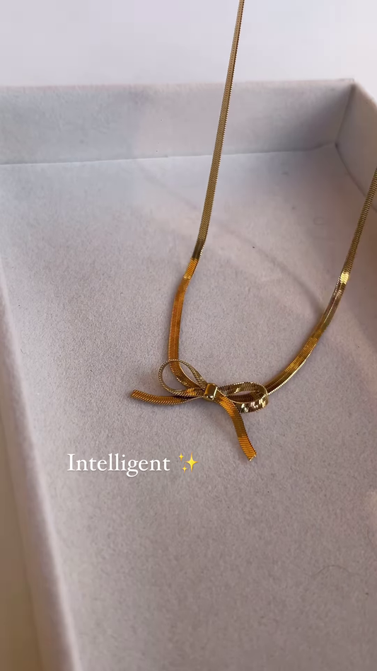 Elegant Gold-Toned Bow Pendant Necklace – Delicate and Charming