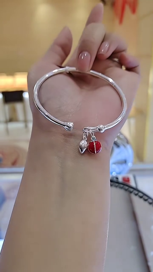 Charming Silver-Toned Bangle Bracelet with Enamel Ladybug and Leaf Charms