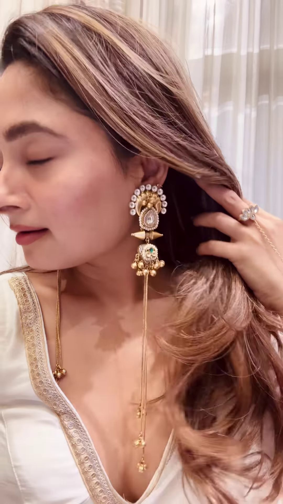 Elegant Gold-Toned Statement Earrings with Intricate Detailing and Chain Drapes