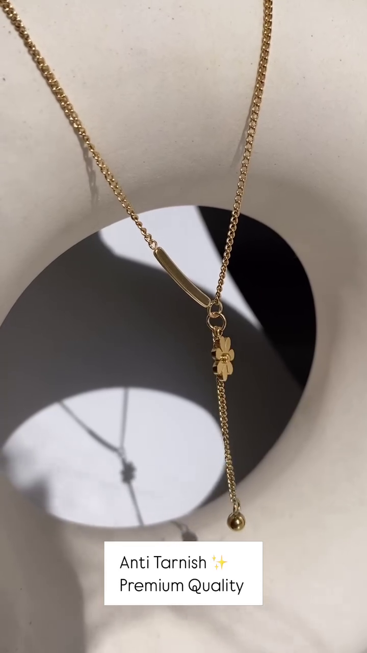 Delicate Layered Gold-Toned Necklace with Four-Leaf Clover and Pearl Pendants