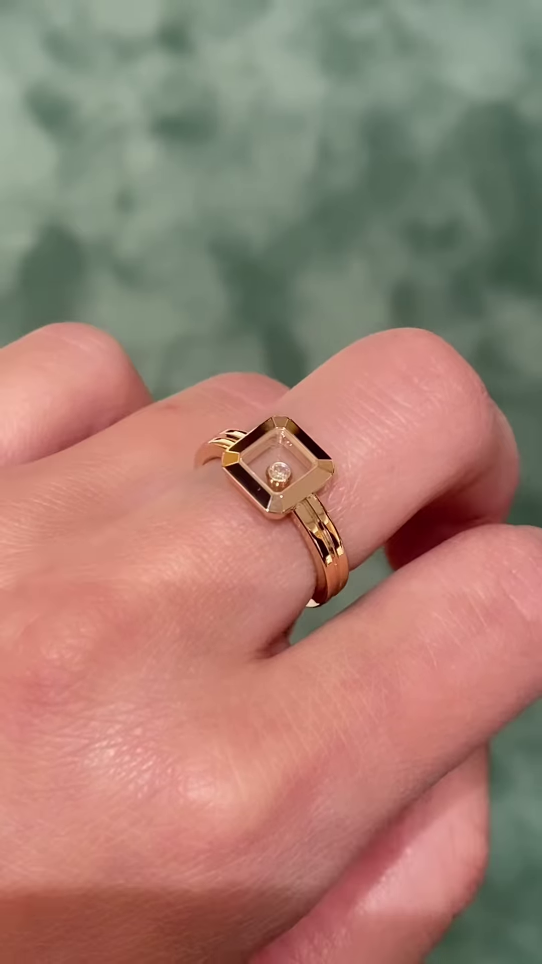 Elegant Gold-Toned Statement Ring with Floating Clear Gemstone