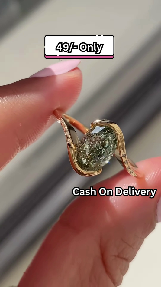 Elegant Gold-Toned Statement Ring with Oval Green Gemstone and Pave Accents