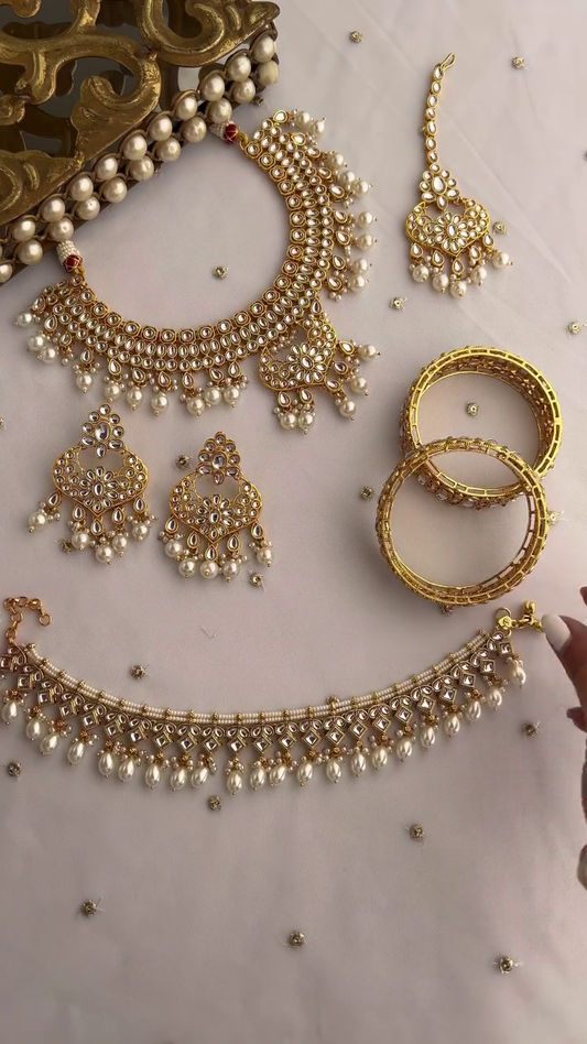 Elegant Gold-Toned Kundan Necklace Set with Pearl Drops