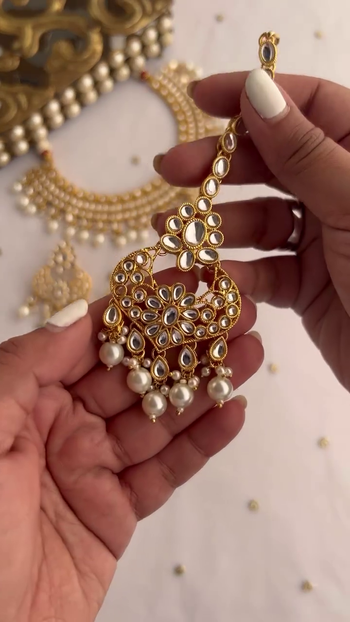 Elegant Gold-Toned Kundan Necklace Set with Pearl Drops