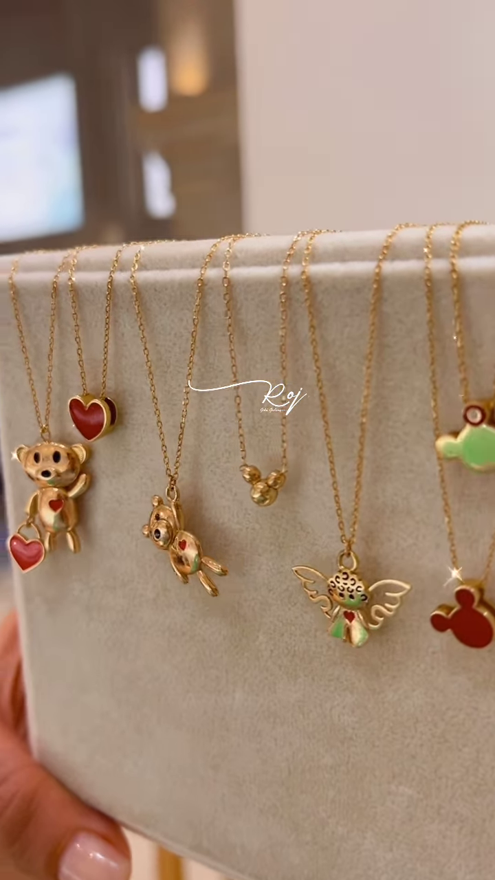 Elegant Gold-Toned Necklaces with Animal Pendants