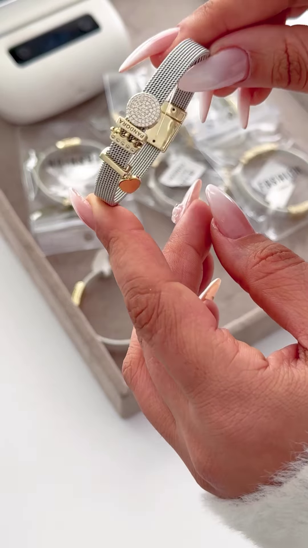 Elegant Silver-Toned Mesh Bracelet with Gold Accents and Crown Charm